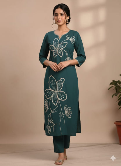 Thick green embroidered kurtaset with organza dupatta
